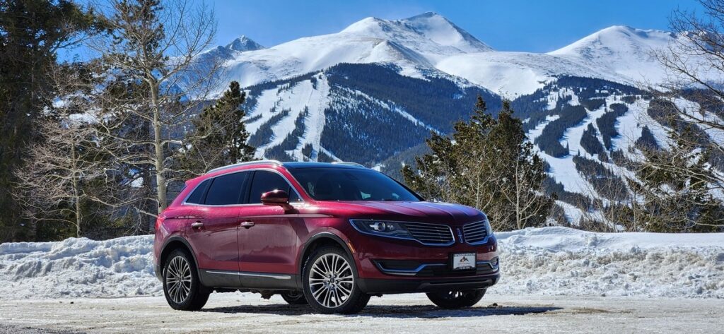 Lincoln MKX all-wheel-drive rental in front of the Tenmile Range near Breckenridge
